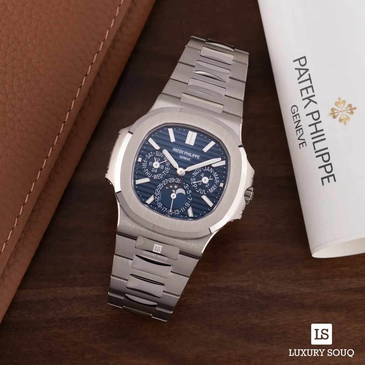 Patek Philippe Nautilus 5740/1G-001 Ewiger Kalender 18kt Weißgold 40mm Blaues Indexzifferblatt Herrenuhr